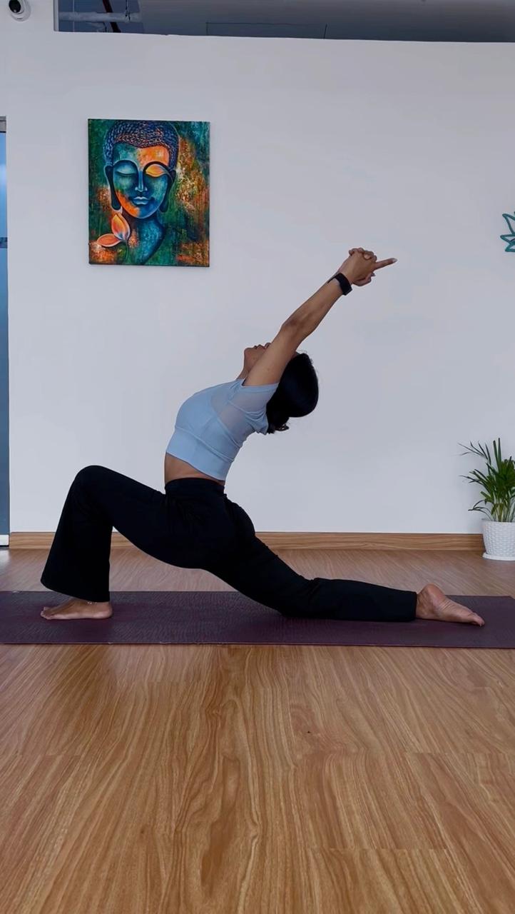 Female yoga instructor guiding a private session for comfort privacy and confidence